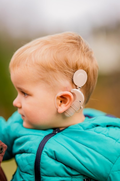 Child wearing a hearing aid